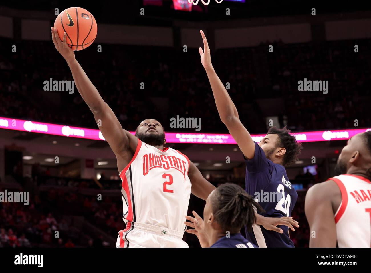 Columbus, Ohio, USA. 20th Jan, 2024. Ohio State Buckeyes guard Bruce Thornton (2) lays up a shot around Penn State Nittany Lions forward Zach Hicks (24) during the game between the Penn State Nittany Lions and the Ohio State Buckeyes at Value City Arena, Columbus, Ohio. (Credit Image: © Scott Stuart/ZUMA Press Wire) EDITORIAL USAGE ONLY! Not for Commercial USAGE! Stock Photo