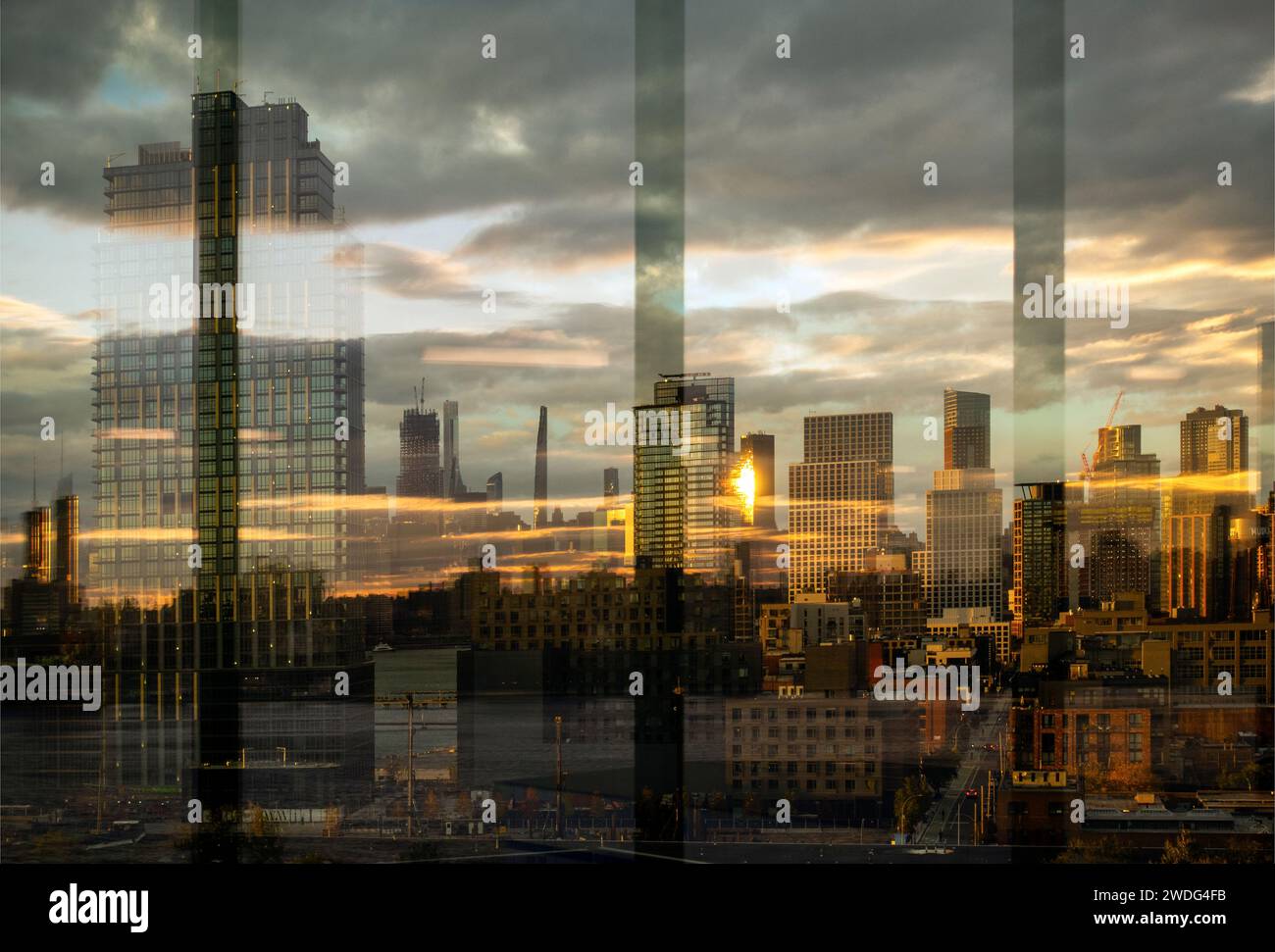 double window reflection Long Island City Queens skyline from a building in Williamsburg Brooklyn NYC Stock Photo