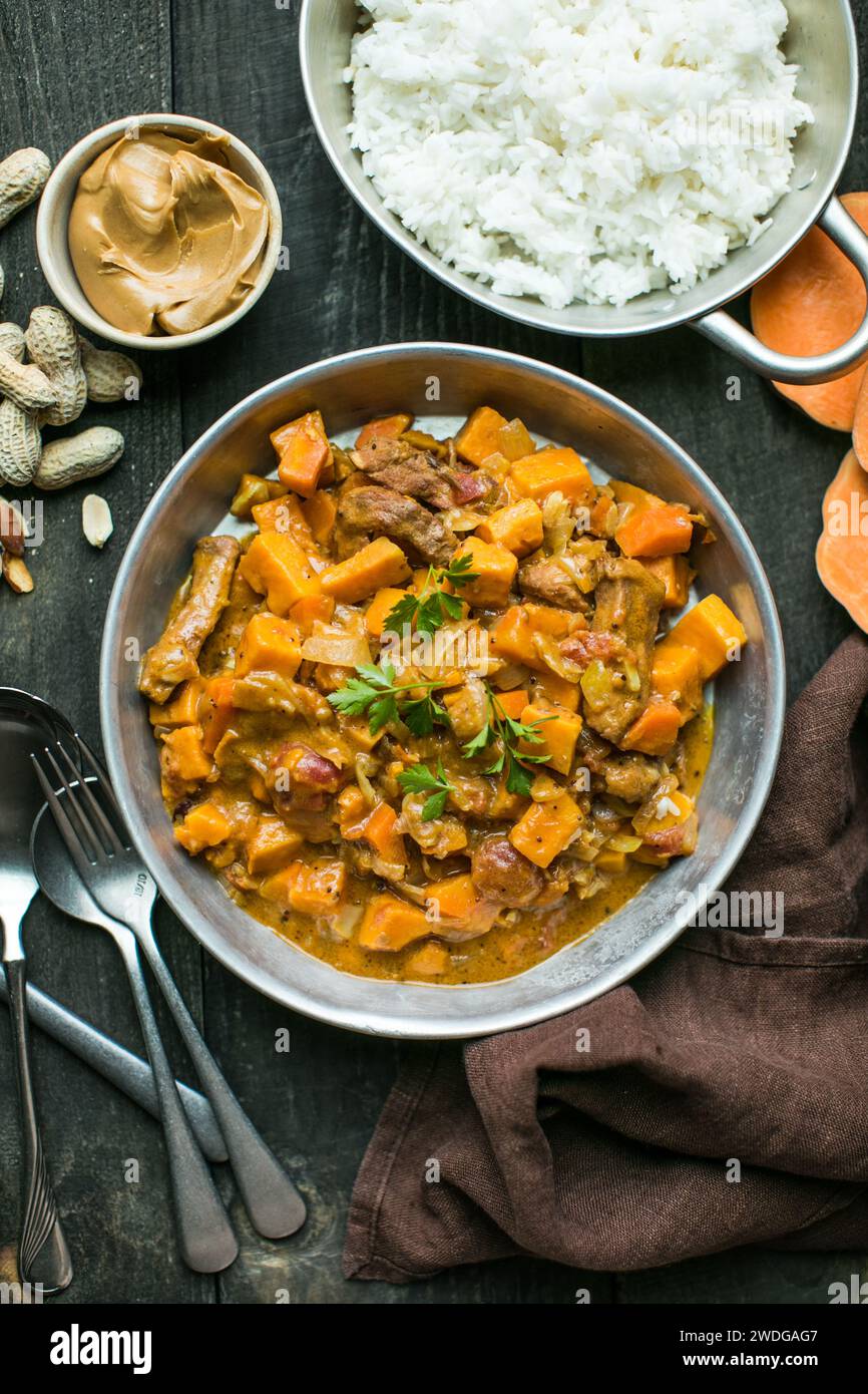 African chicken peanut stew with sweet potatoes with side of basmati ...