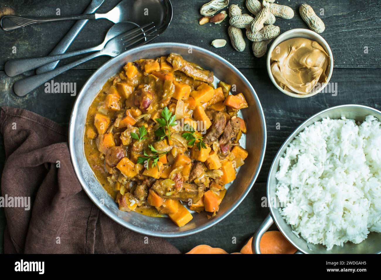 African chicken peanut stew with sweet potatoes with side of basmati ...