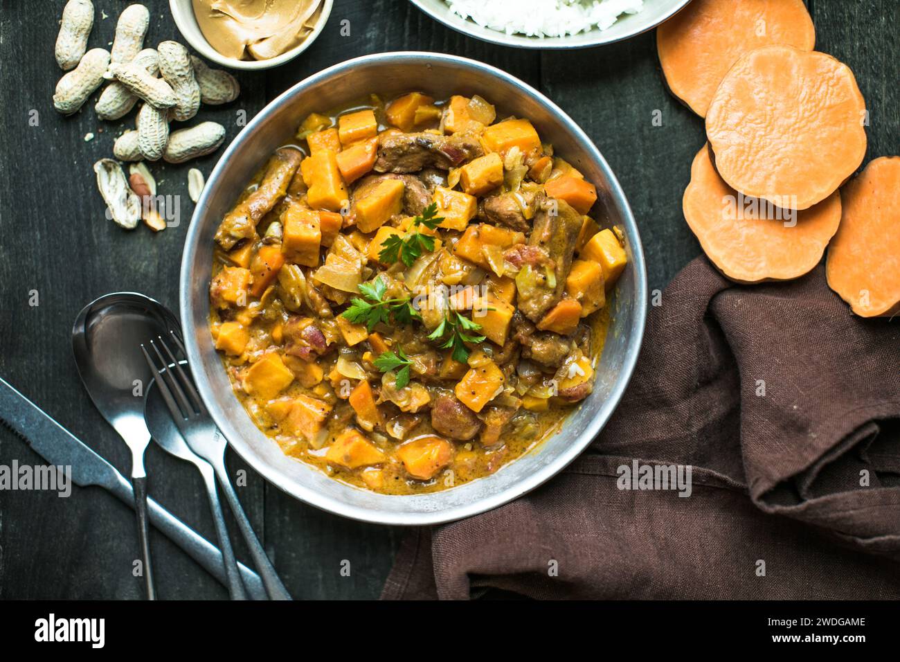 African chicken peanut stew with sweet potatoes with side of basmati ...