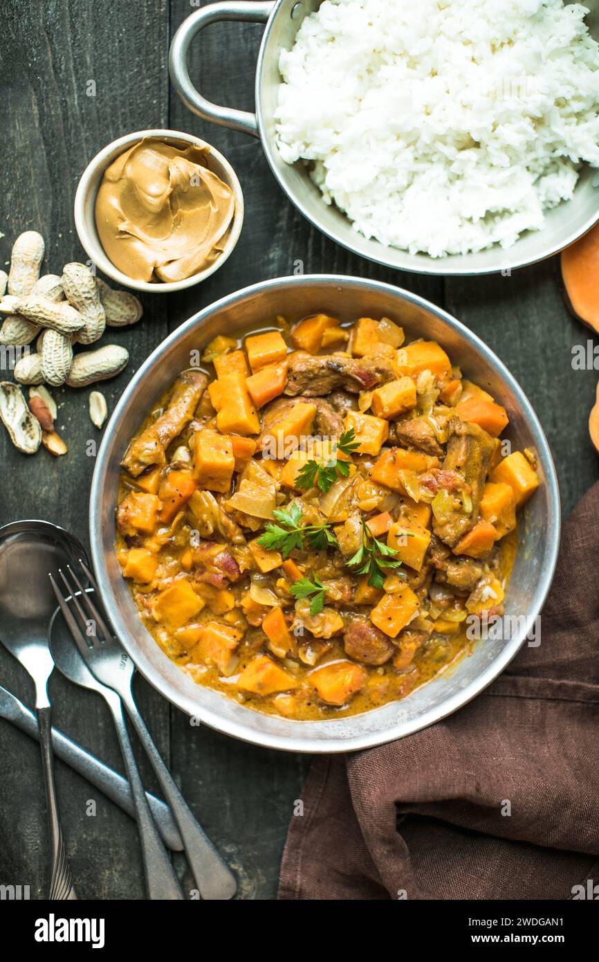 African chicken peanut stew with sweet potatoes with side of basmati ...