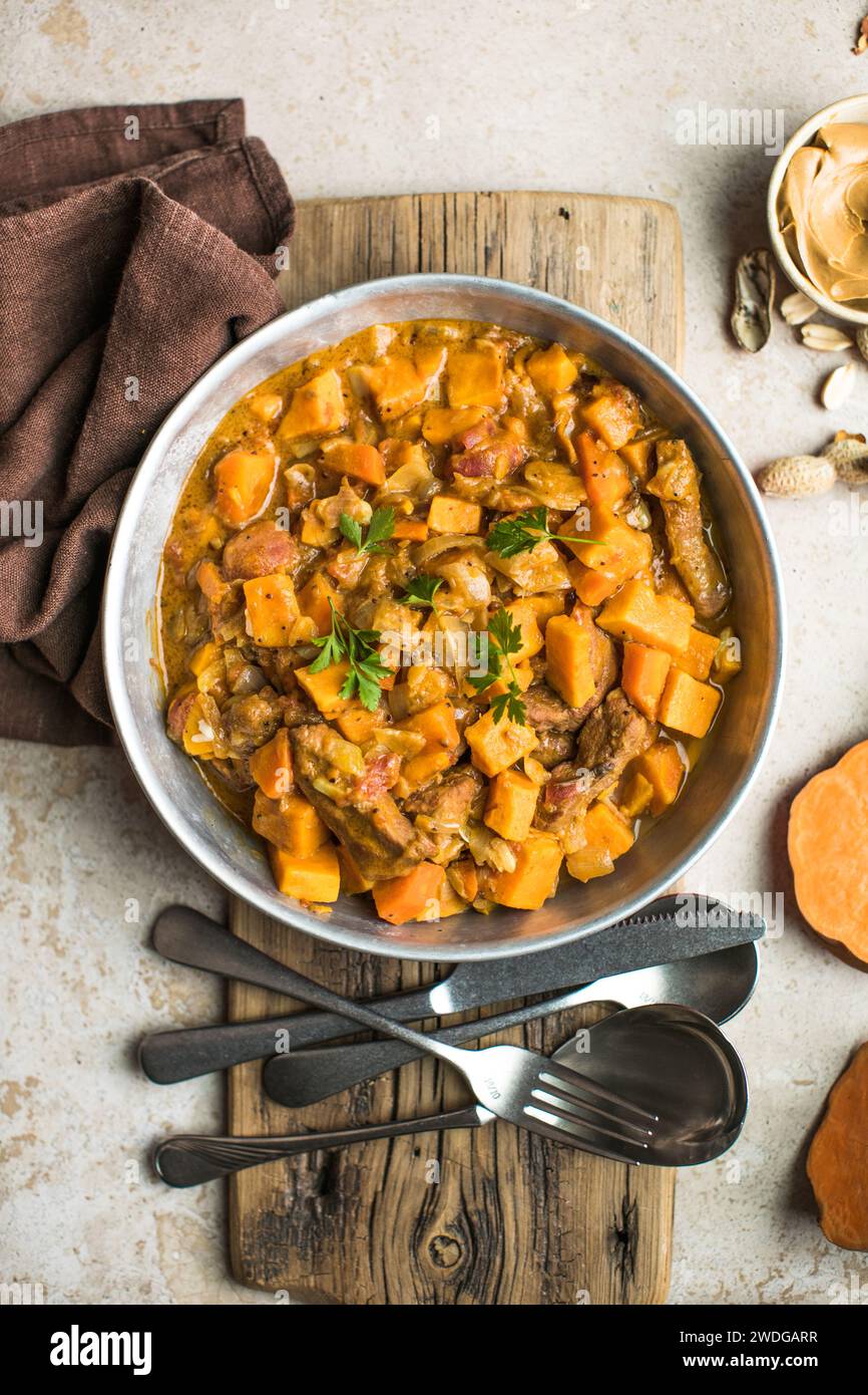African chicken peanut stew with sweet potatoes with side of basmati ...