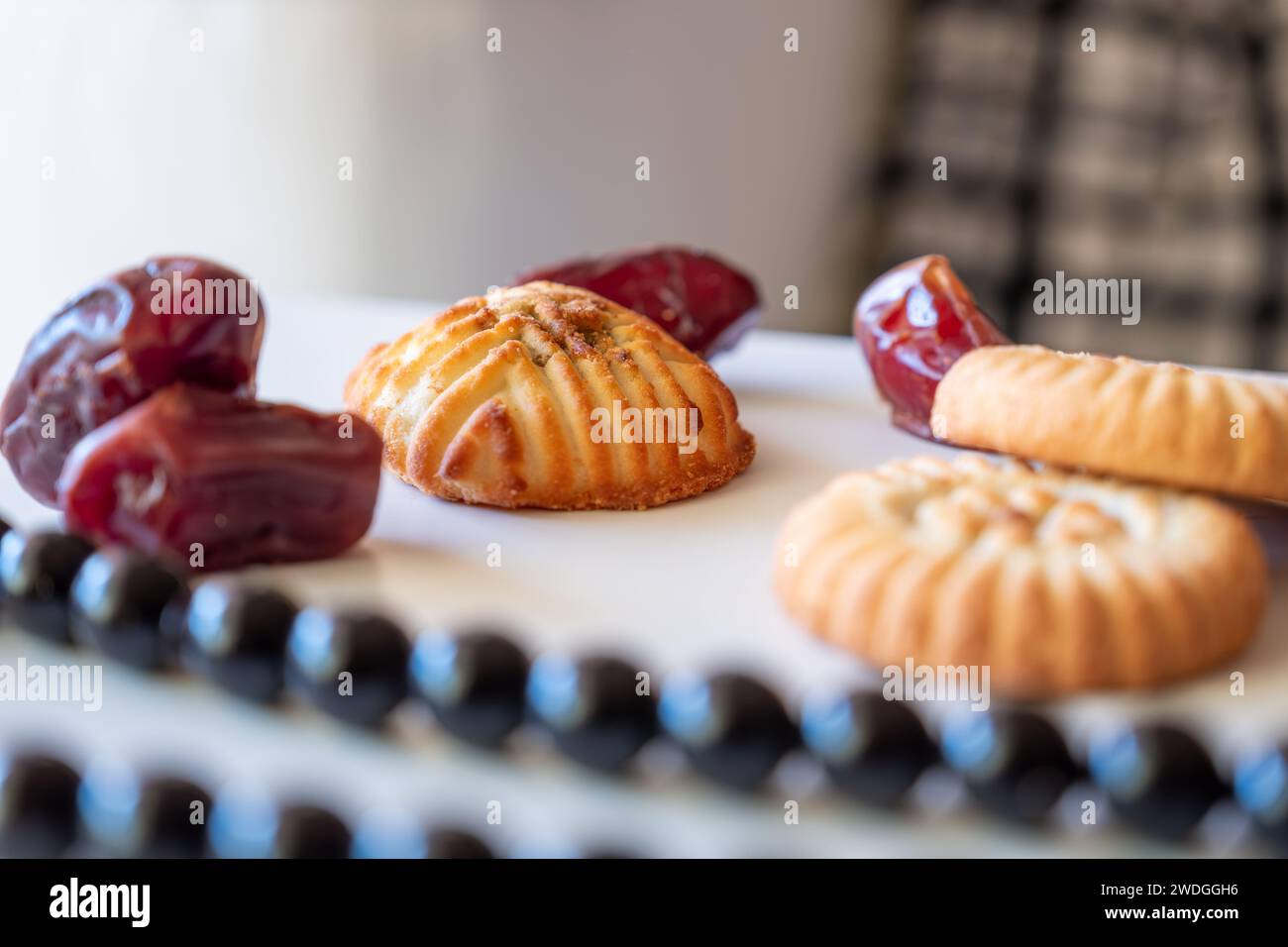 Variety of semolina maamoul cookies displayed with crescent ,star and ...