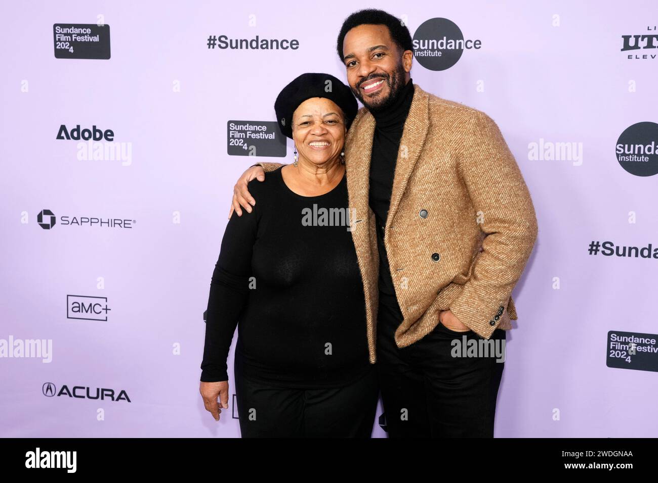 Andre Holland and his mother Mary Holland attend the premiere of