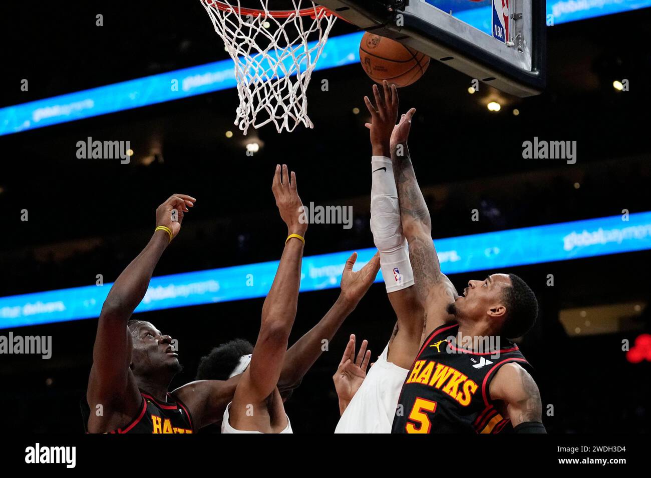 Atlanta Hawks guard Dejounte Murray (5) rebounds the ball in the first