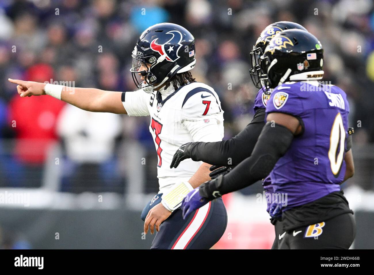 Baltimore, United States. 20th Jan, 2024. Houston Texans quarterback C.J. Stroud (7) argues about an offensive penalty during the first half an AFC Divisional Round playoff game as Baltimore Ravens linebacker Roquan Smith (0) watches at M&T Bank Stadium in Baltimore, Maryland, on Saturday, January 20, 2024. Photo by David Tulis/UPI Credit: UPI/Alamy Live News Stock Photo