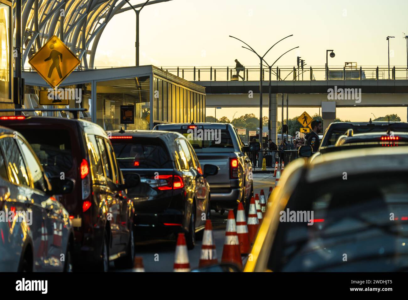 Heavy traffic at sunset beneath the South Terminal canopy at Hartsfield