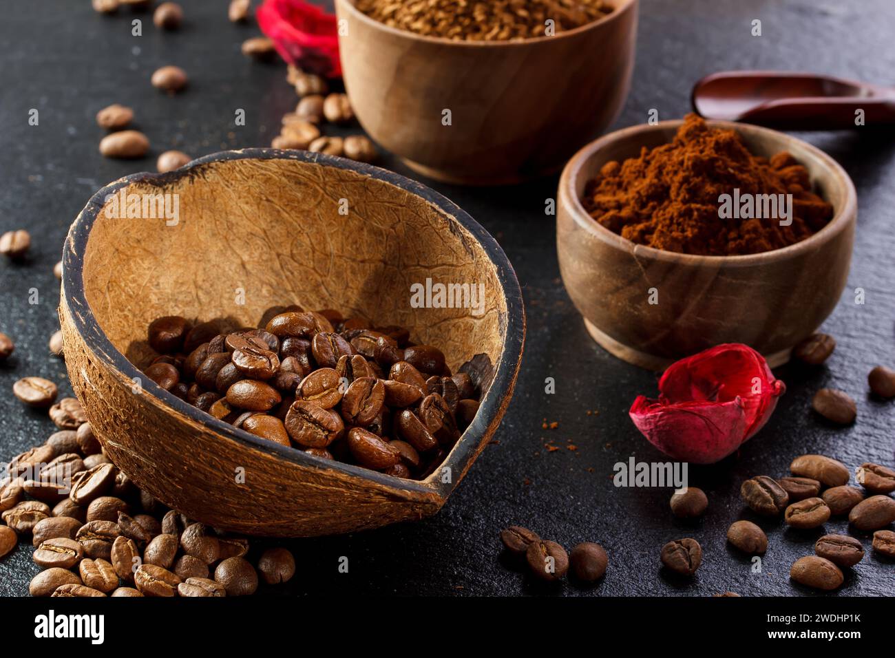 Coffee beans, powder on wooden background Stock Photo