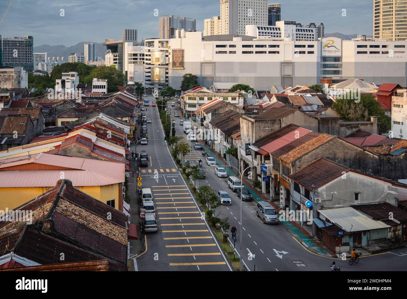 Penang, Malaysia. 17th Jan, 2024. Aerial view in the early morning of George Town City, Penang Island. George Town, the capital of the Malaysian island of Penang is known for its British colonial buildings, Chinese shophouses, and mosques. Beyond the old town, George Town is a modern city with skyscrapers and shopping malls. Credit: SOPA Images Limited/Alamy Live News Stock Photo