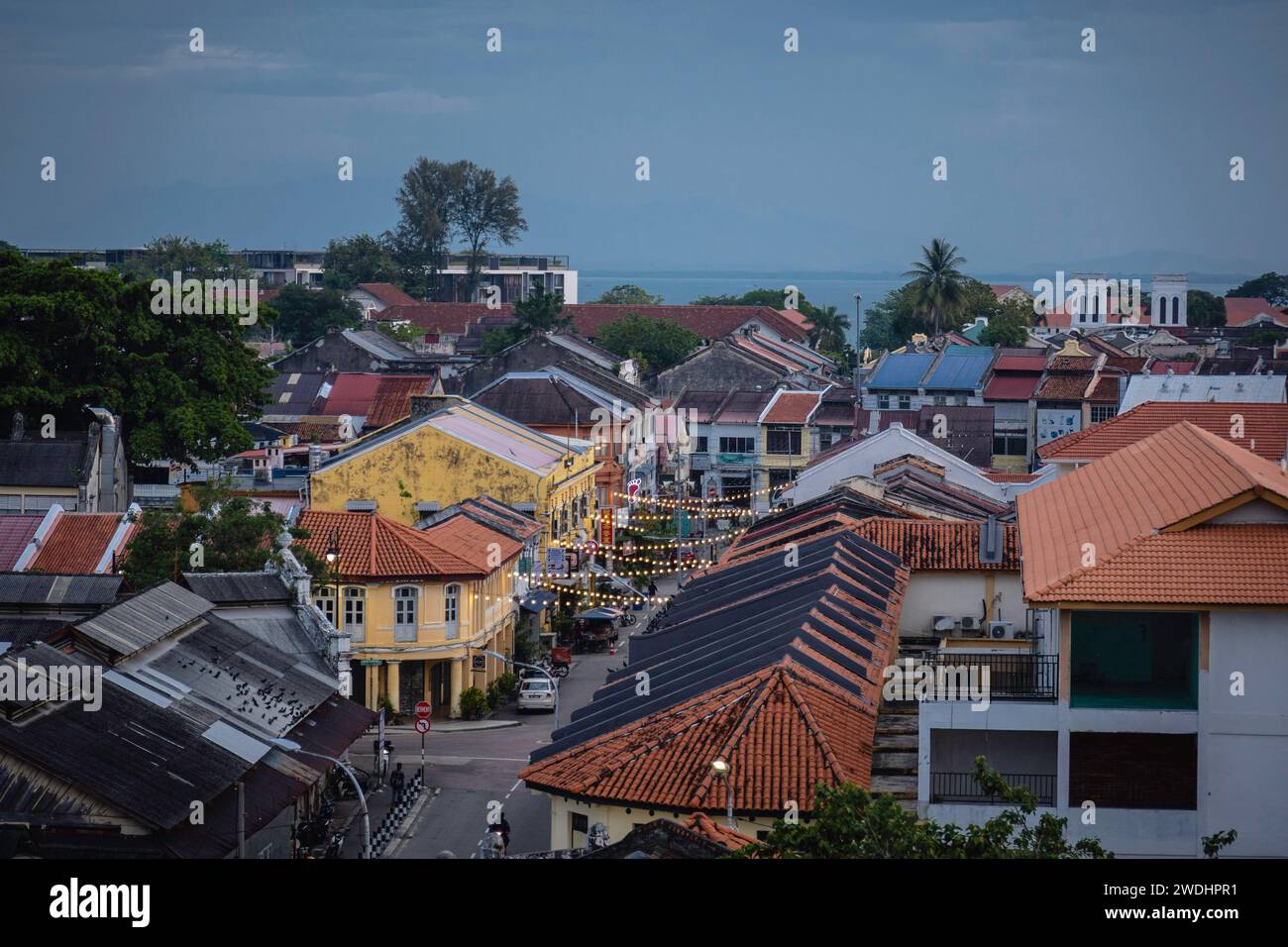 Penang, Malaysia. 17th Jan, 2024. Aerial view in the early morning of George Town City, Penang Island. George Town, the capital of the Malaysian island of Penang is known for its British colonial buildings, Chinese shophouses, and mosques. Beyond the old town, George Town is a modern city with skyscrapers and shopping malls. (Photo by Nathalie Jamois/SOPA Images/Sipa USA) Credit: Sipa USA/Alamy Live News Stock Photo