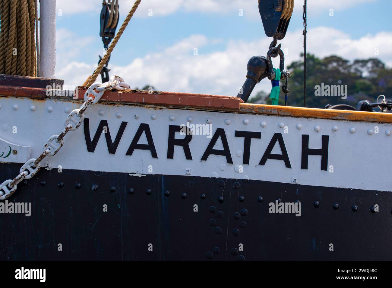 A close up of the bow and name on the hull of the coal fired, 1902 steam tug Waratah, owned and run by the Sydney Heritage Fleet Stock Photo