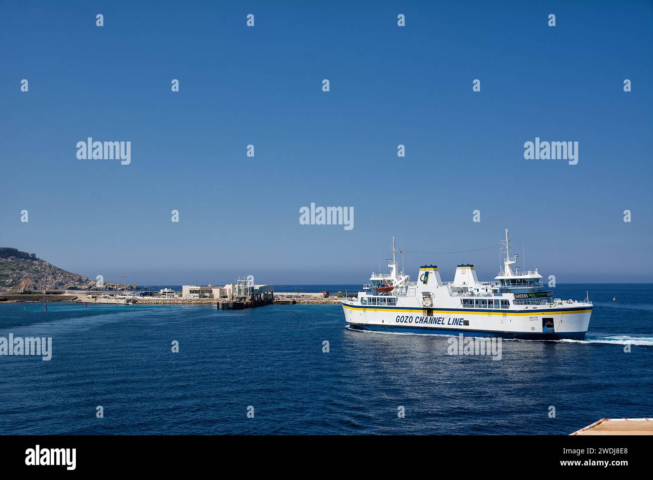 Cirkewwa, Malta - 19 June, 2023: Carferry from Gozo returns to the port of Cirkewwa Stock Photo