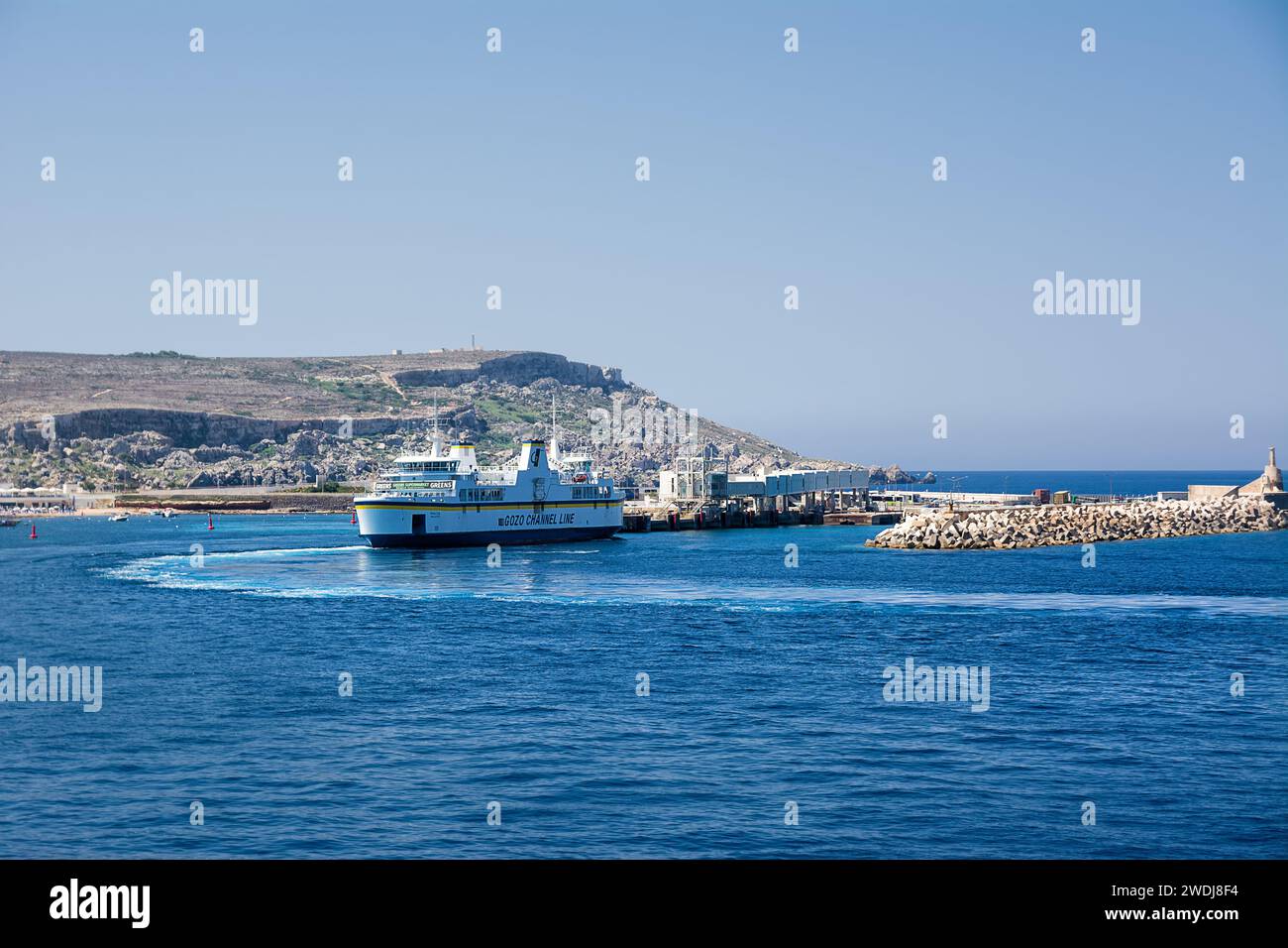 Cirkewwa, Malta - 19 June, 2023: Carferry from Gozo returns to the port of Cirkewwa Stock Photo