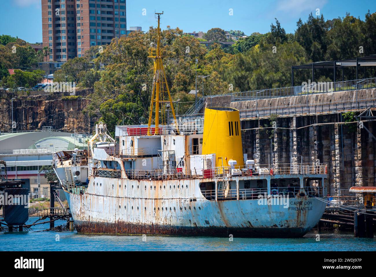 The historic Australian coastal freighter vessel MV Cape Don moored at Balls Head in Sydney Harbour while it is being restored by local volunteers. Stock Photo