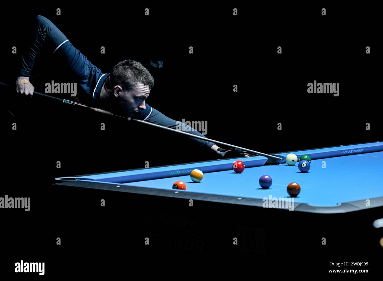 Jakarta, Indonesia. 21st Jan, 2024. Oliver Szolnoki of Hungary competes during the qualification match between Oliver Szolnoki of Hungary and Darryl Chia Son Yew of Malaysia at the 10-Ball Indonesia International Open 2024 in Jakarta, Indonesia, Jan. 21, 2024. Credit: Agung Kuncahya B./Xinhua/Alamy Live News Stock Photo