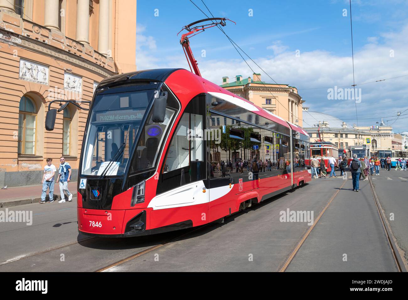 SAINT PETERSBURG, RUSSIA - MAY 20, 2023: Modern Russian tram 71-923M 'Bogatyr M' on a sunny day. Exhibit of the international transport festival SPbTr Stock Photo
