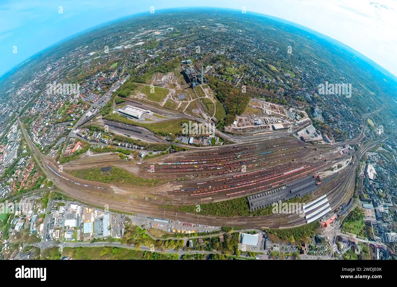 Aerial view, freight yard and fallow land of the former General Blumenthal mine, decommissioned Shamrock power plant, earth globe, fisheye image, 360 Stock Photo