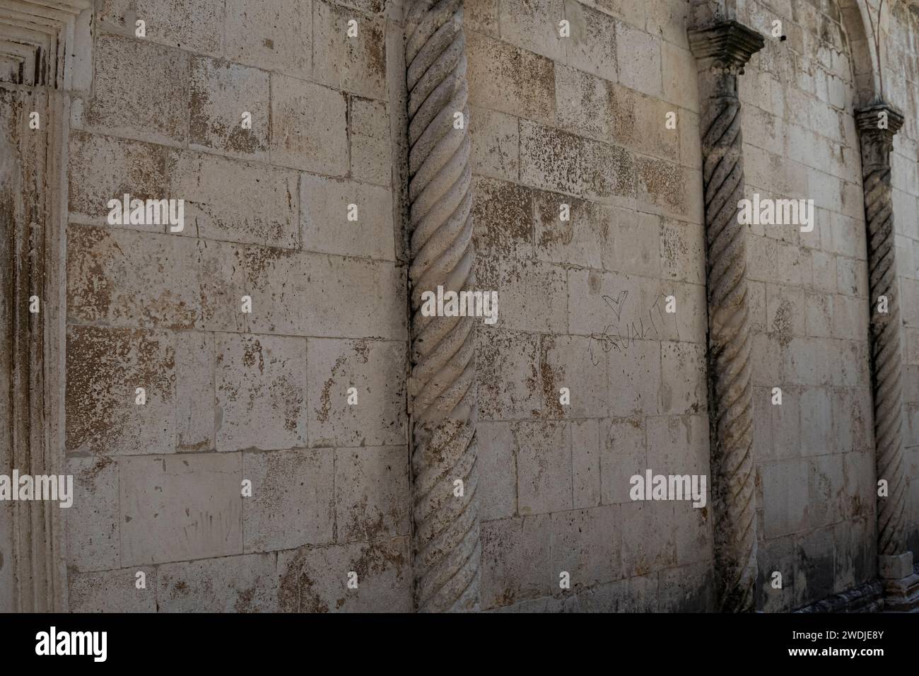 Pillars at the side wall of Church of Saint Chrysogonus in the city of Zadar Stock Photo
