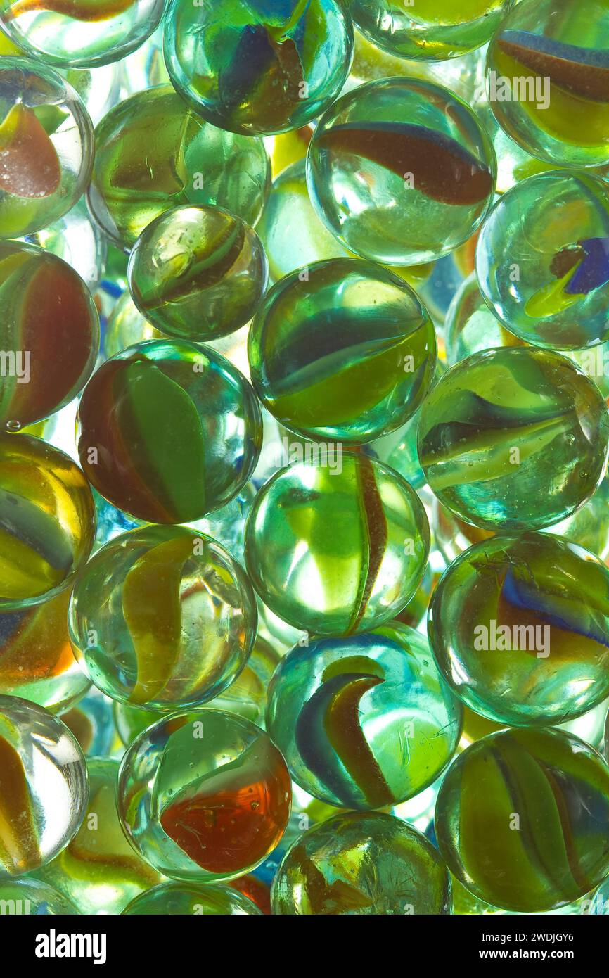 A collection of cat eye marbles Stock Photo - Alamy