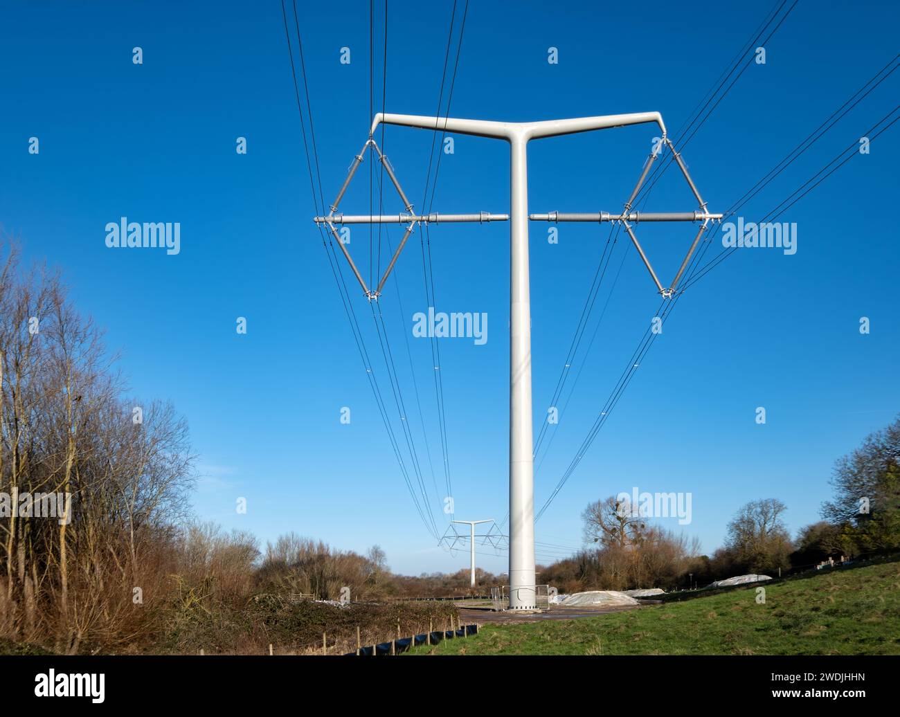 Somerset UK: New design National Grid T Pylons running through the Somerset countryside as part of the new Hinkley Point C Power Station connection Stock Photo