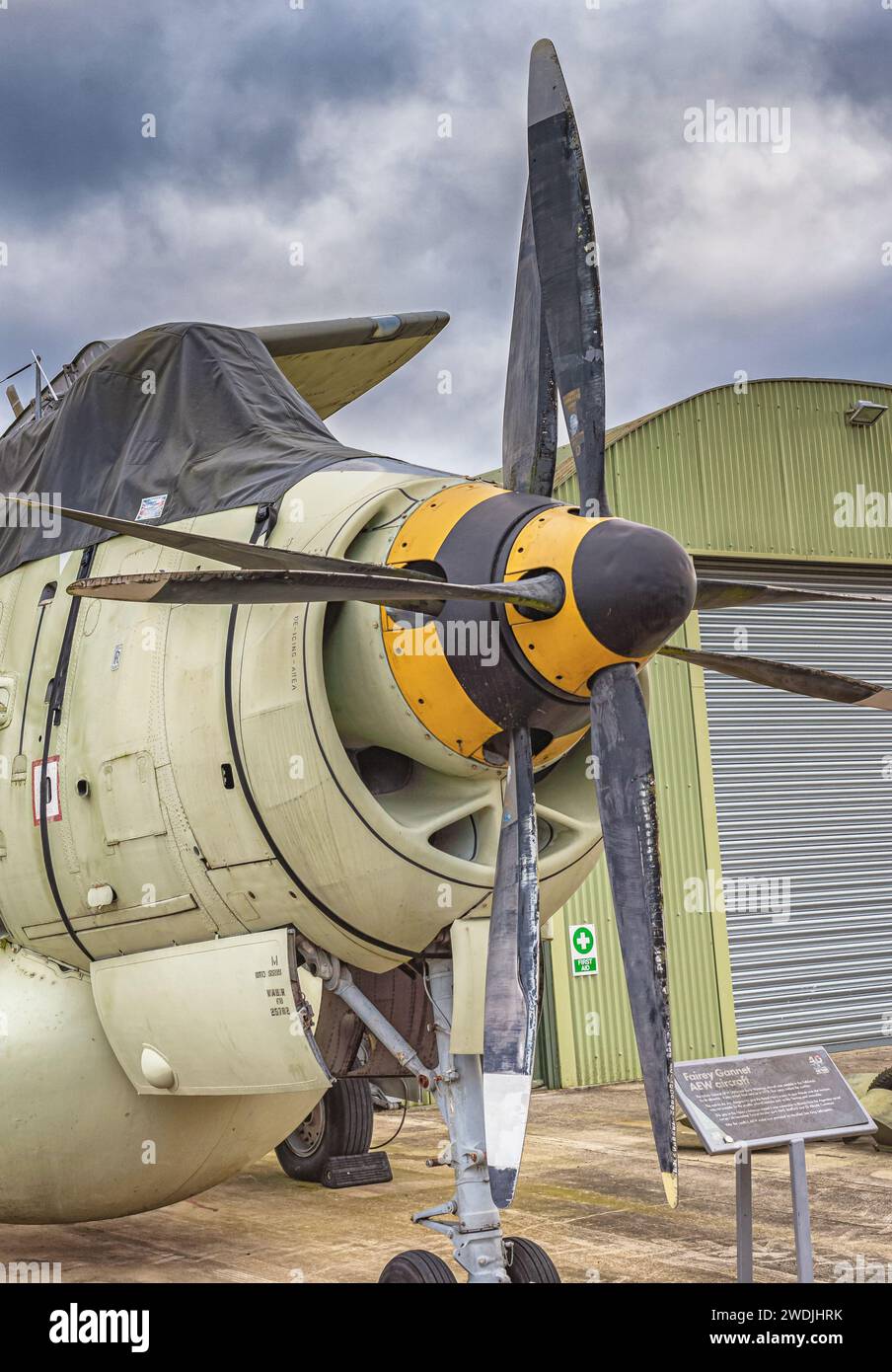 An early warning aircraft with twin propellors on display at an air