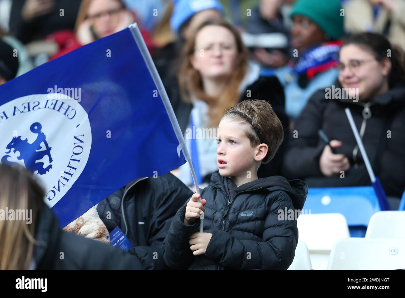 London UK 21st January 2024 Stamford Bridge London England Womens   London Uk 21st January 2024 Stamford Bridge London England Womens Super League Football Chelsea Versus Manchester United Young Chelsea Fan Waving A Flag In Support Of Her Team Credit Action Plus Sports Imagesalamy Live News 2WDJNGT 