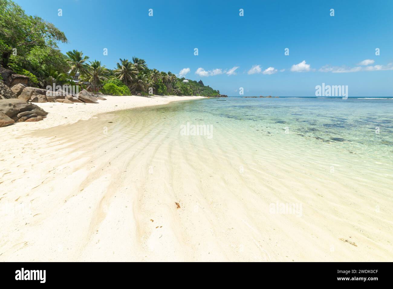 White sand and granite rocks in Anse Forbans. Mahe island, Seychelles Stock Photo