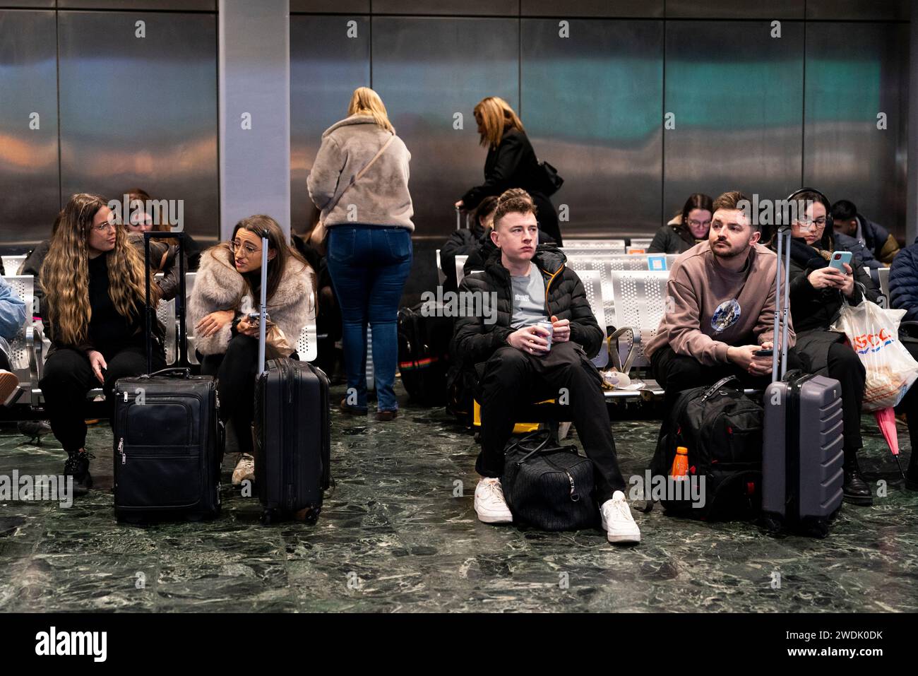 passengers-at-euston-station-london-following-train-delays-as-storm