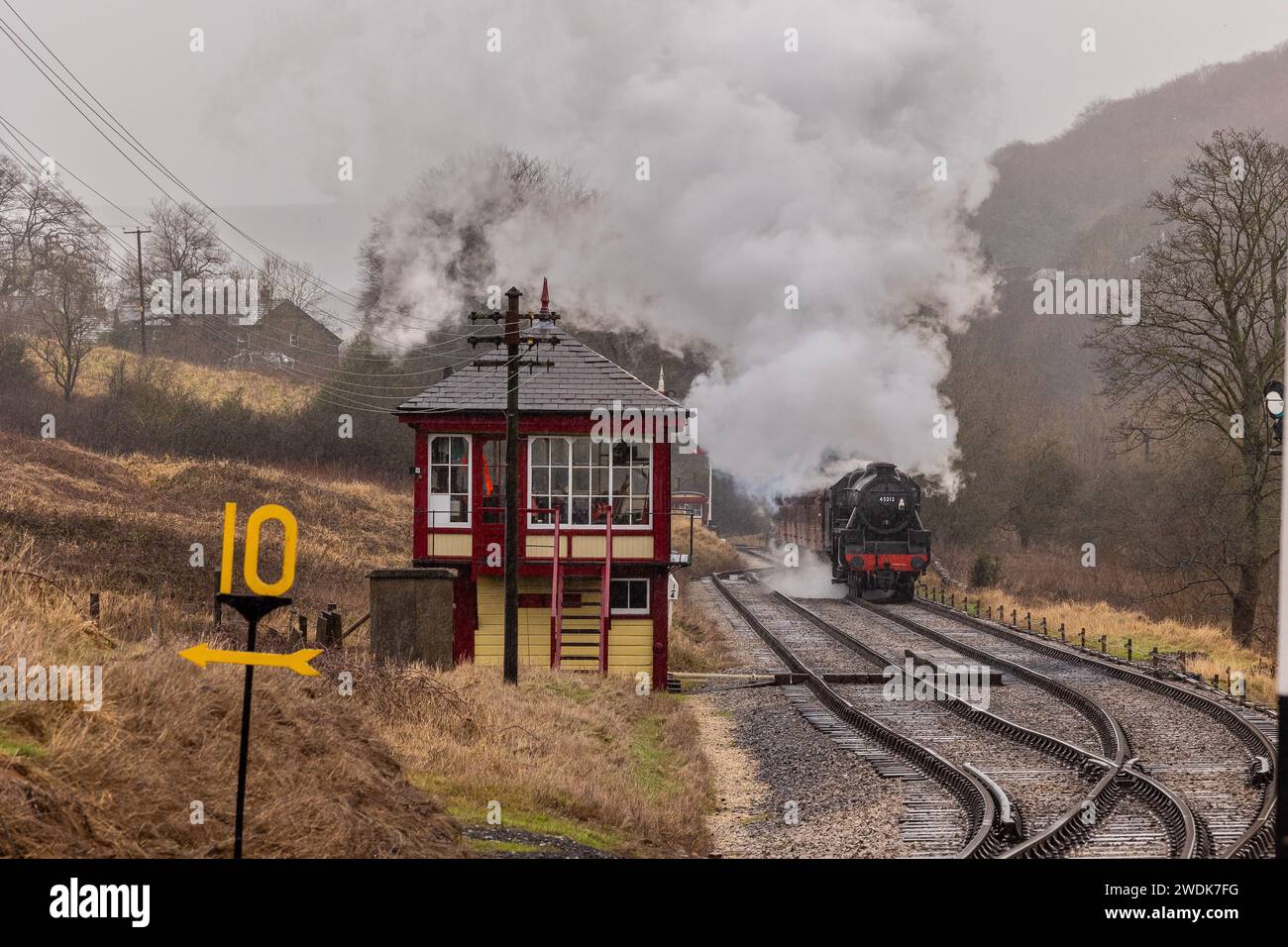 Keighley, UK, 21 January 2024, UK Weather. LMS Black 5 45212 climbs up the incline into Damems Loop in stormy conditions. Credit: Neil Terry/ Neil Terry Photography Credit: Neil Terry/Alamy Live News Stock Photo