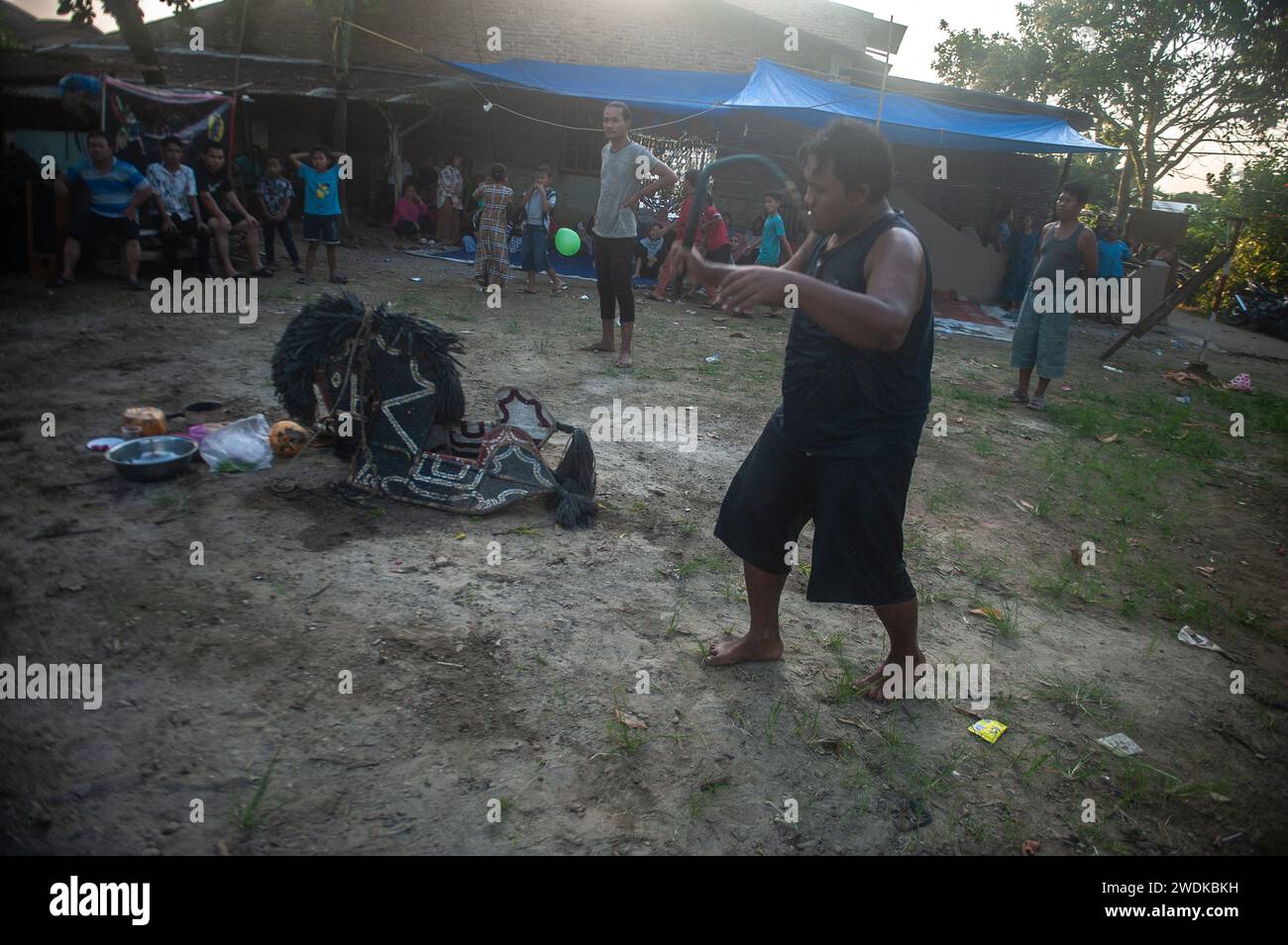 An Indigenous Javanese man is seen whipping the ground while acting the ...