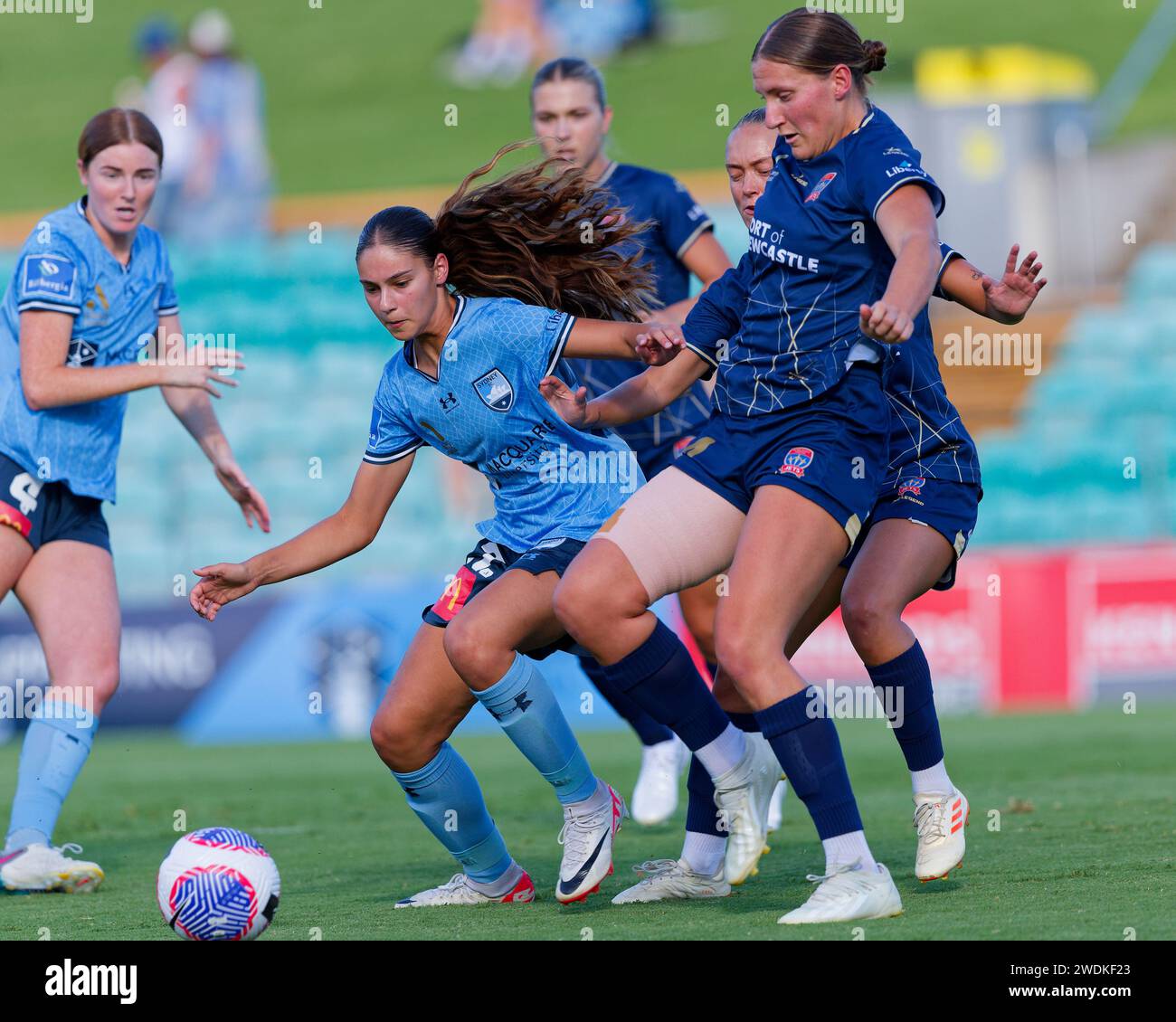 Sydney, Australia. 21st Jan, 2024. Natasha Prior of Newcastle Jets competes for the ball with Indiana Dos Santos of Sydney FC during the A-League Women Rd13 match between Sydney FC and Newcastle Jets at Leichhardt Oval on January 21, 2024 in Sydney, Australia Credit: IOIO IMAGES/Alamy Live News Stock Photo