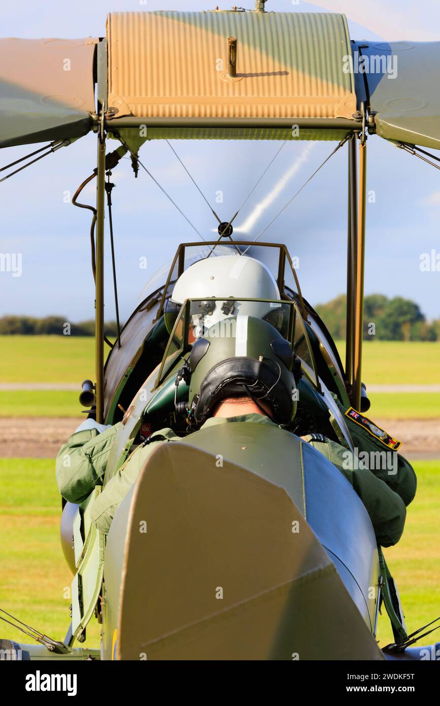 De Haviland DH82B Queen Bee Tiger Moth, G-BLUZ, from behind as it taxis out for take off from RAF Syerston, Nottinghamshire. Stock Photo