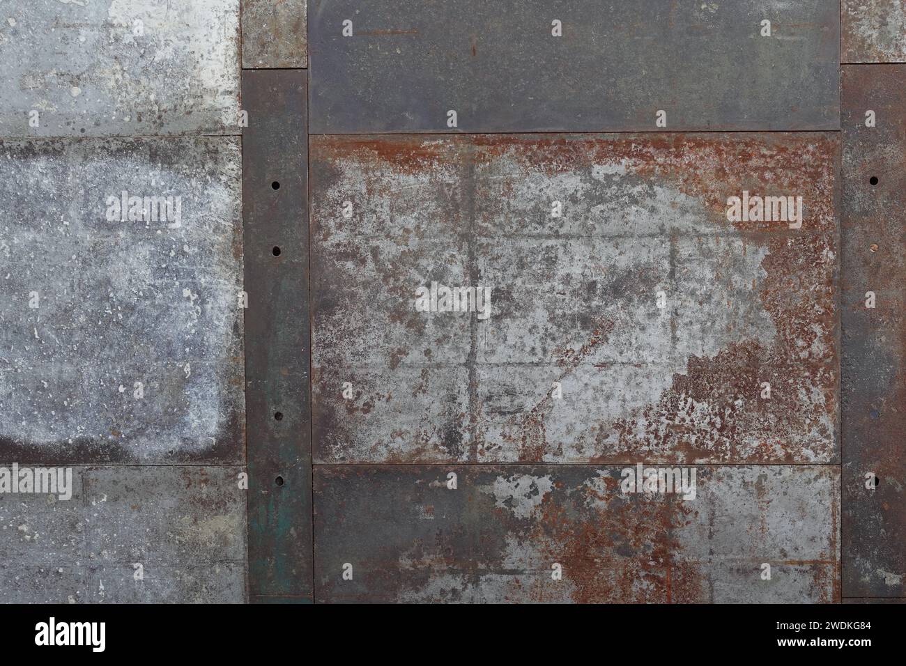 Rusty metal pieces weathered industrial background texture. Stock Photo