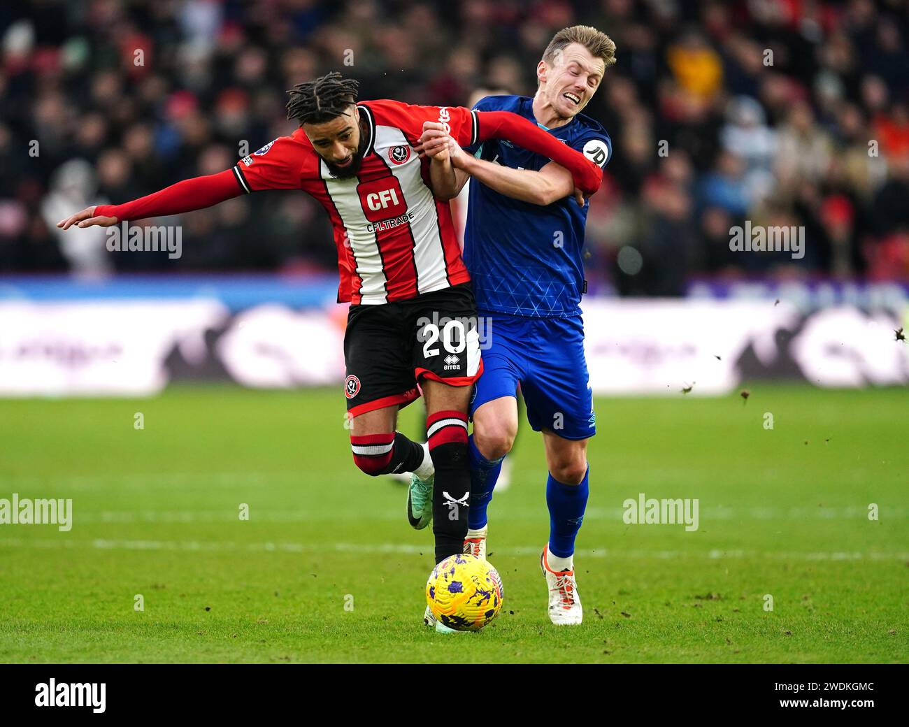 Sheffield United's Jayden Bogle (left) and West Ham United's James Ward-Prowse battle for the ball during the Premier League match at Bramall Lane, Sheffield. Picture date: Sunday January 21, 2024. Stock Photo