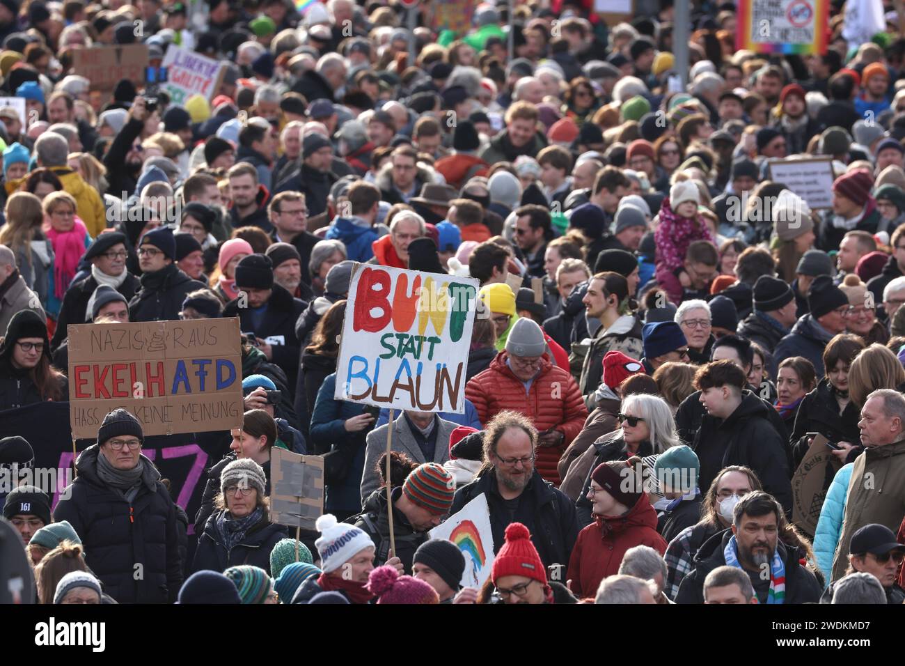 Munich, Germany. 21st Jan, 2024. Demonstrators hold a sign in Ludwigstraße with the inscription 'BUNT STATT BRAUN'. Credit: Karl-Josef Hildenbrand/dpa/Alamy Live News Stock Photo