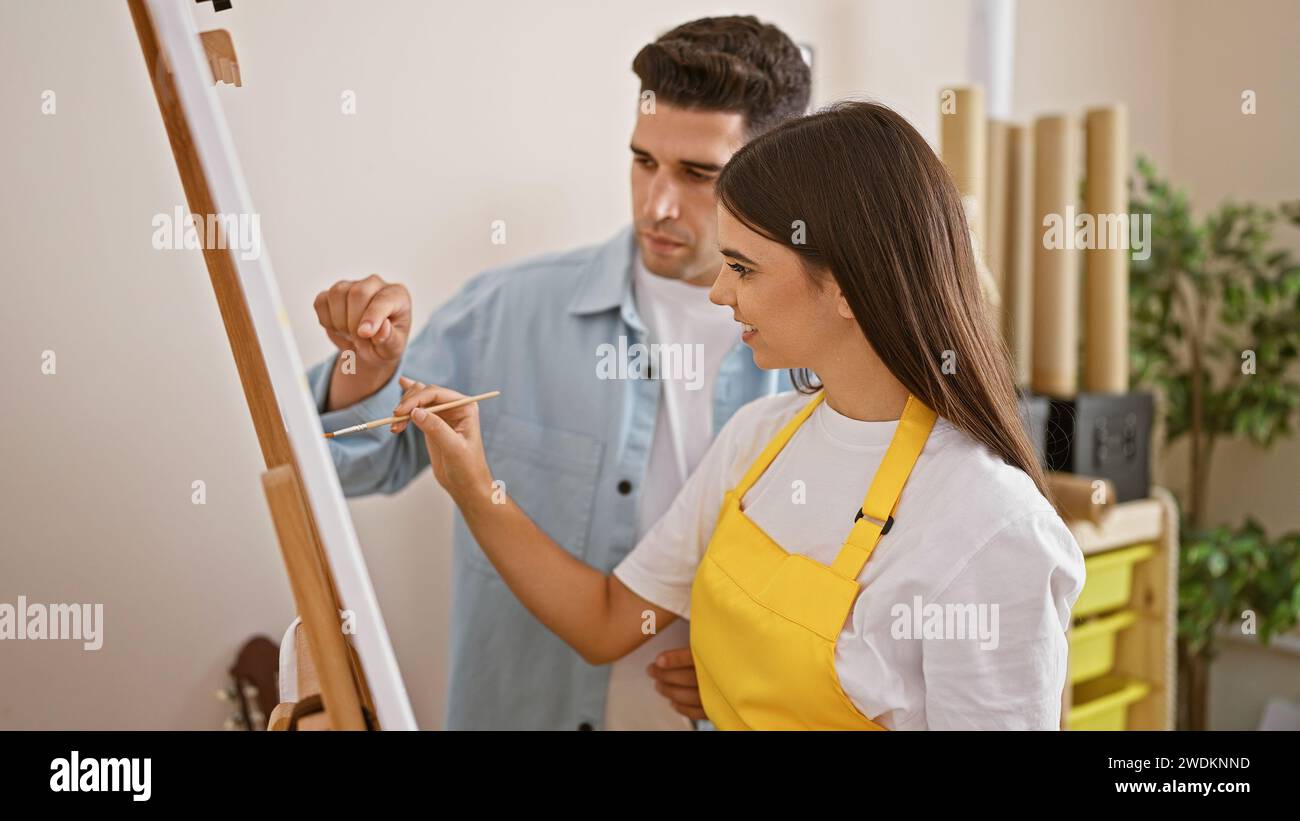 Interior man woman easel hi-res stock photography and images - Alamy