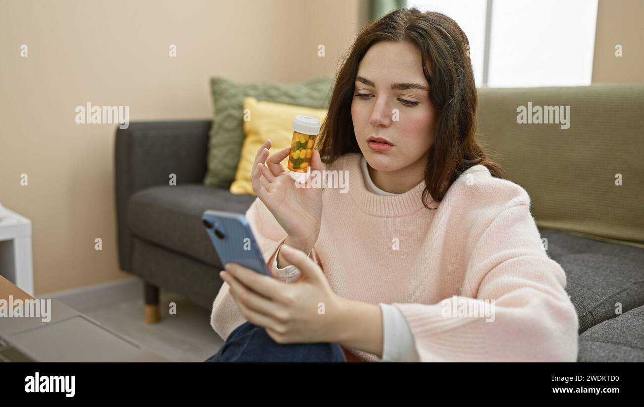 A concerned young woman examines a pill bottle while holding a