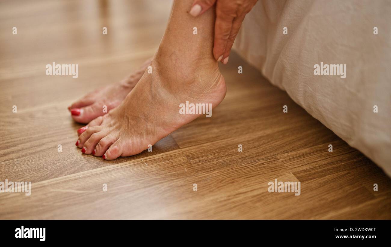 Mature woman tired feet hi-res stock photography and images - Alamy