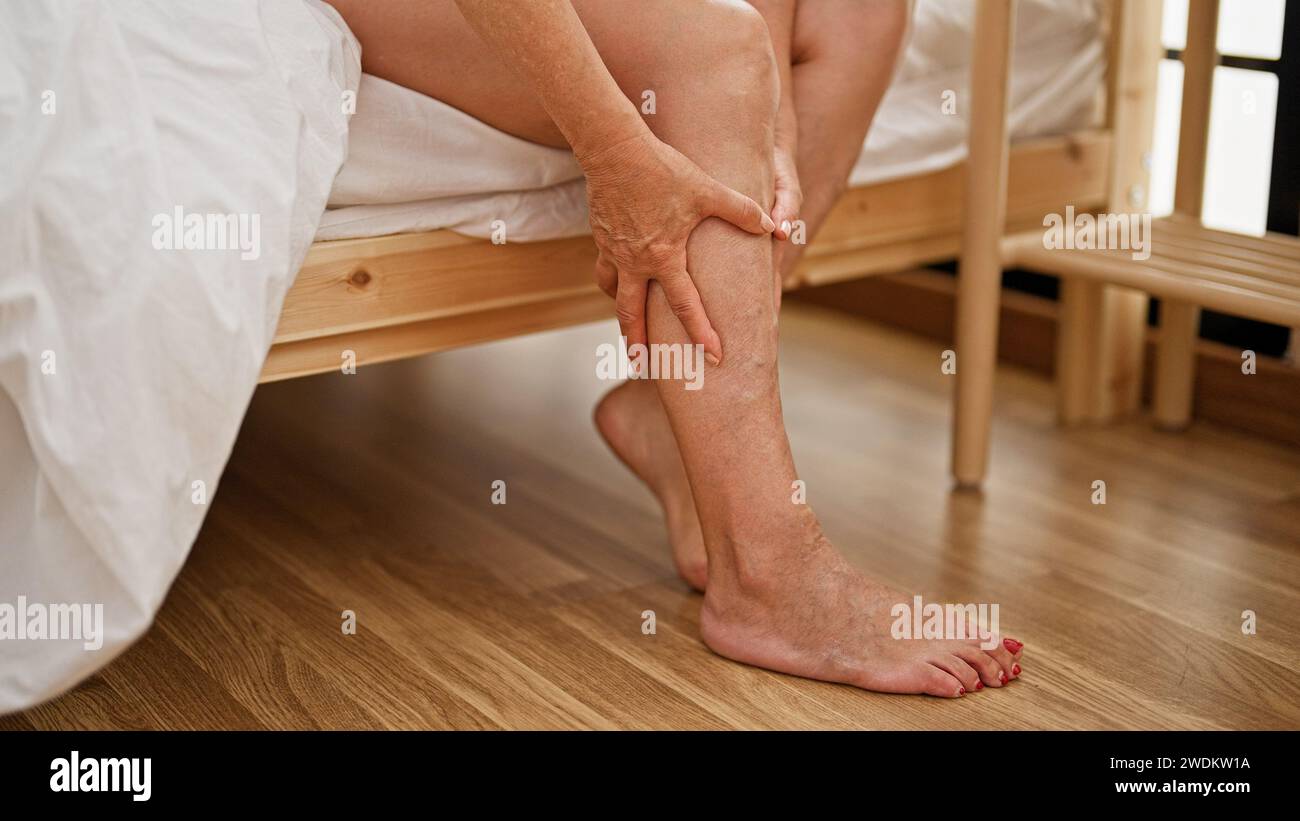 Mature woman tired feet hi-res stock photography and images - Alamy