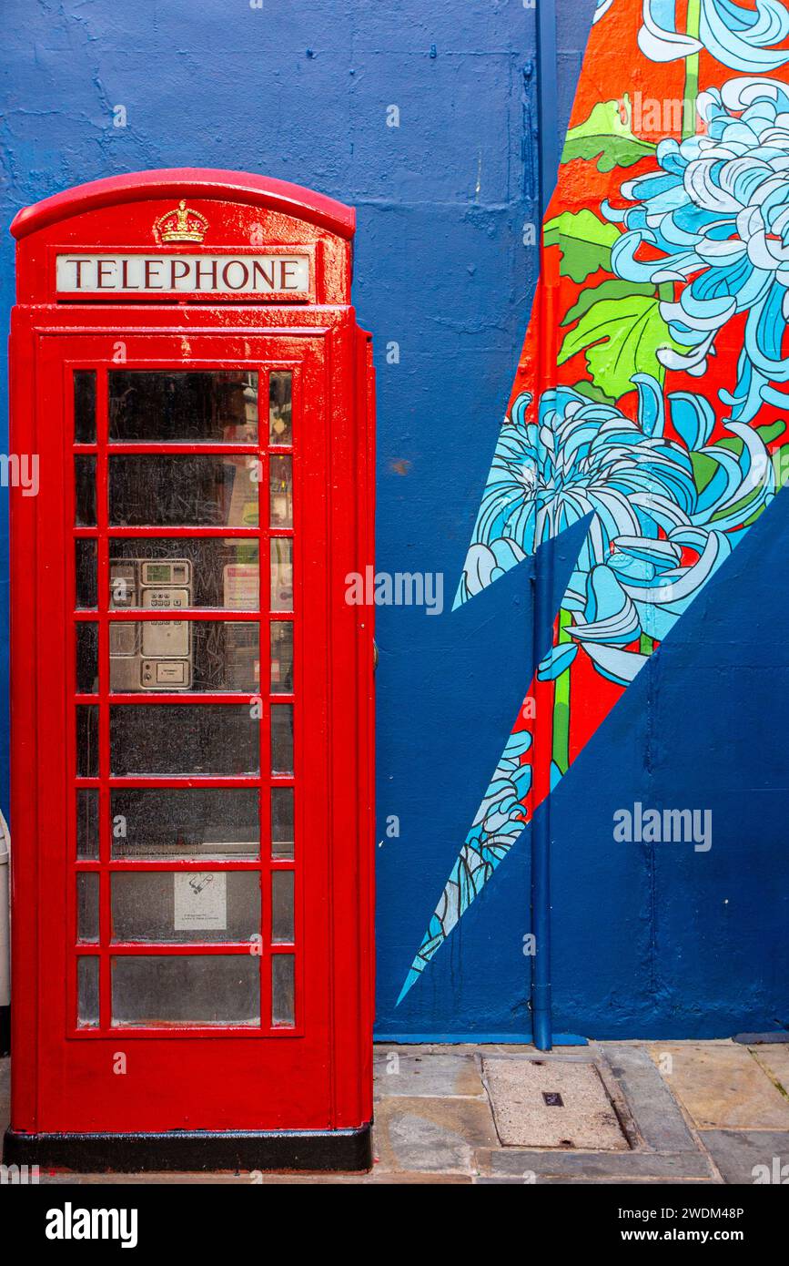 A red telephone box in Heddon Street in London, location for the cover shoot of David Bowie's Ziggy Srtardust and the Spiders from Mars Stock Photo