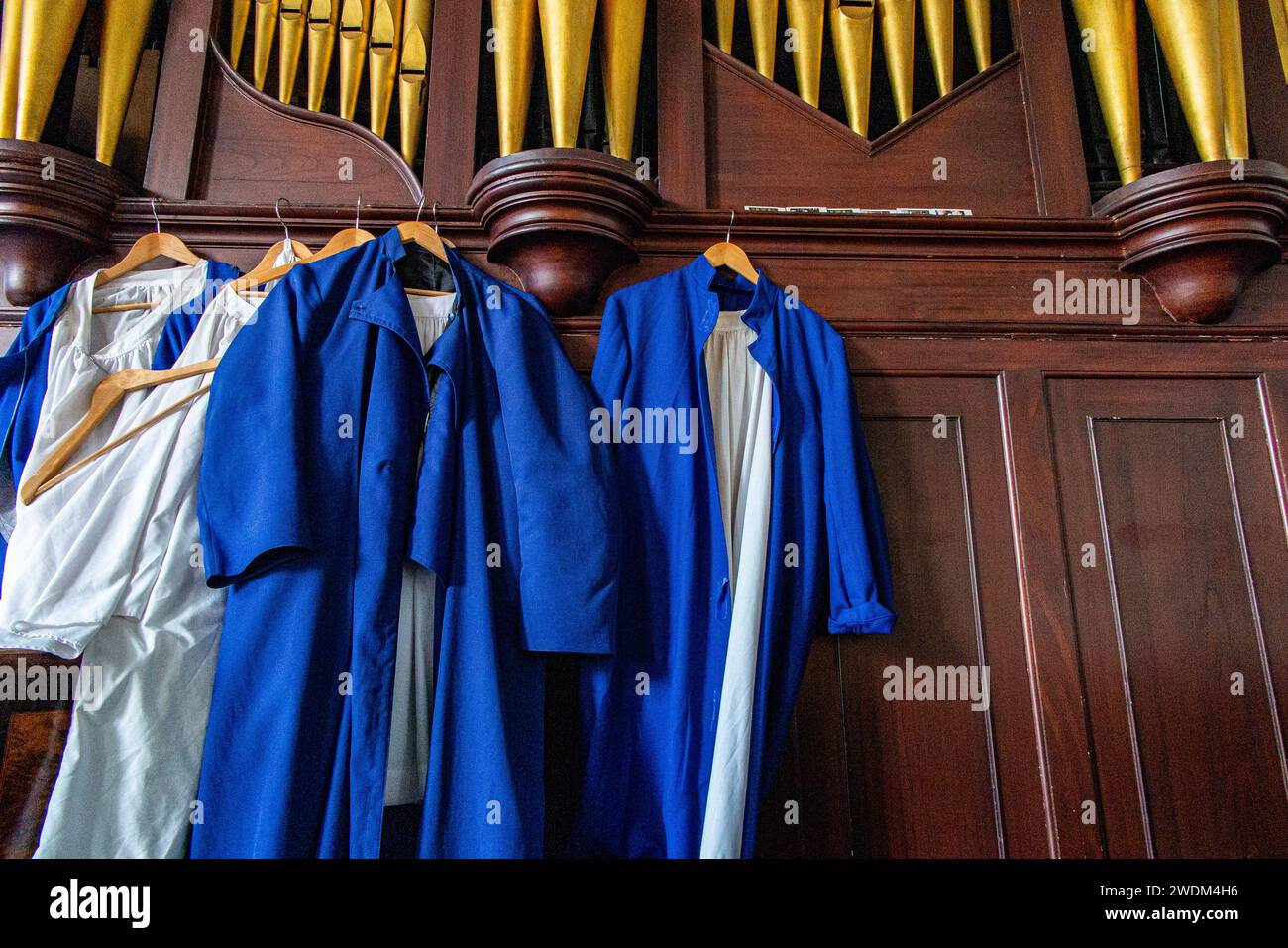 Robes hanging by the organ in the Ordinariate of Our Lady of Walsingham church in Soho, London Stock Photo