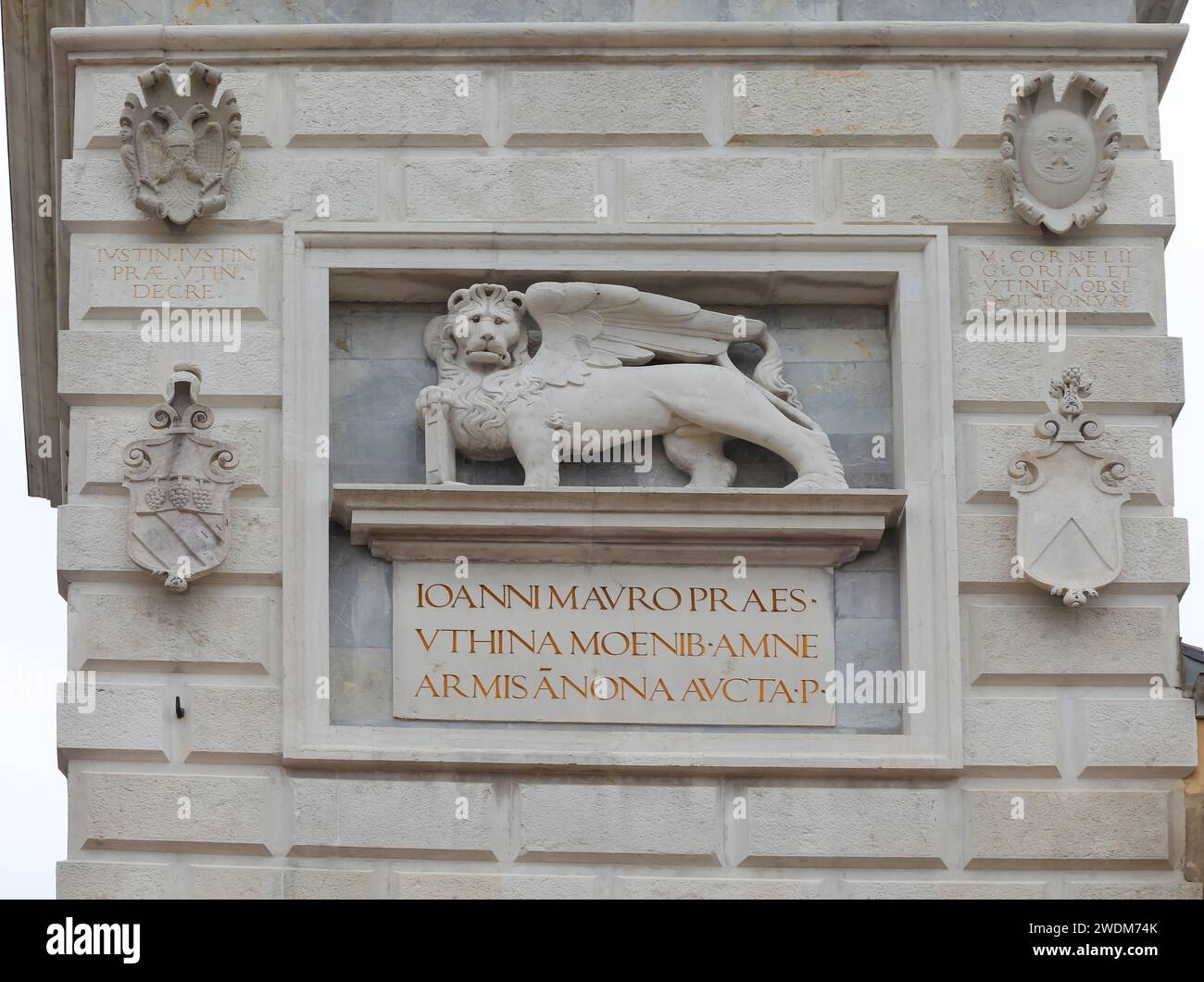 Udine, UD, Italy - December 27, 2023: Winged St. Marks Lion and text describing the person who governed Venice in the 16th century Stock Photo