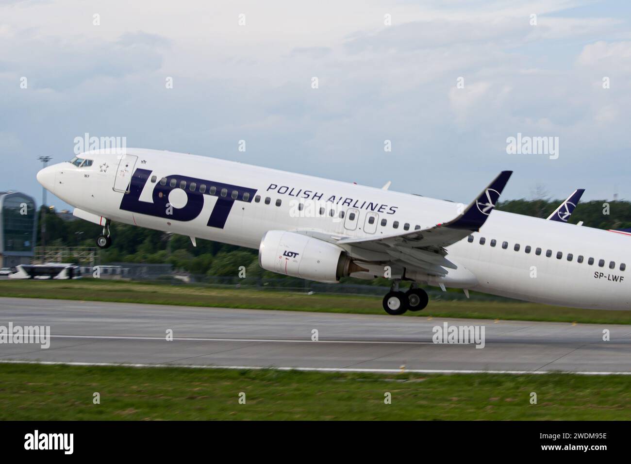 LOT Polish Airlines Boeing 737-800 close-up while taking off from Lviv Airport Stock Photo