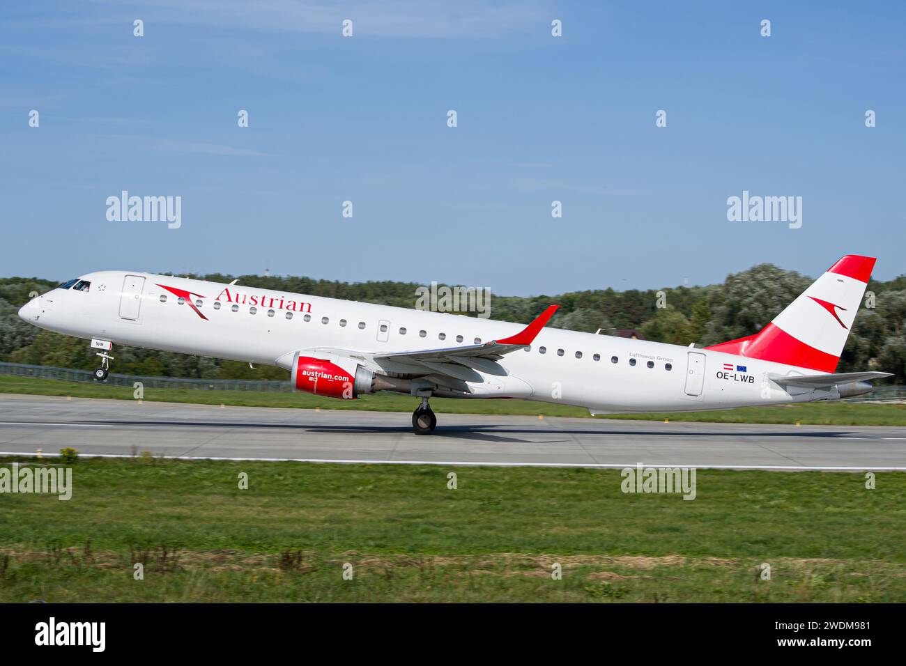 Austrian Airlines Embraer E195 aircraft taking off from Lviv Airport Stock Photo