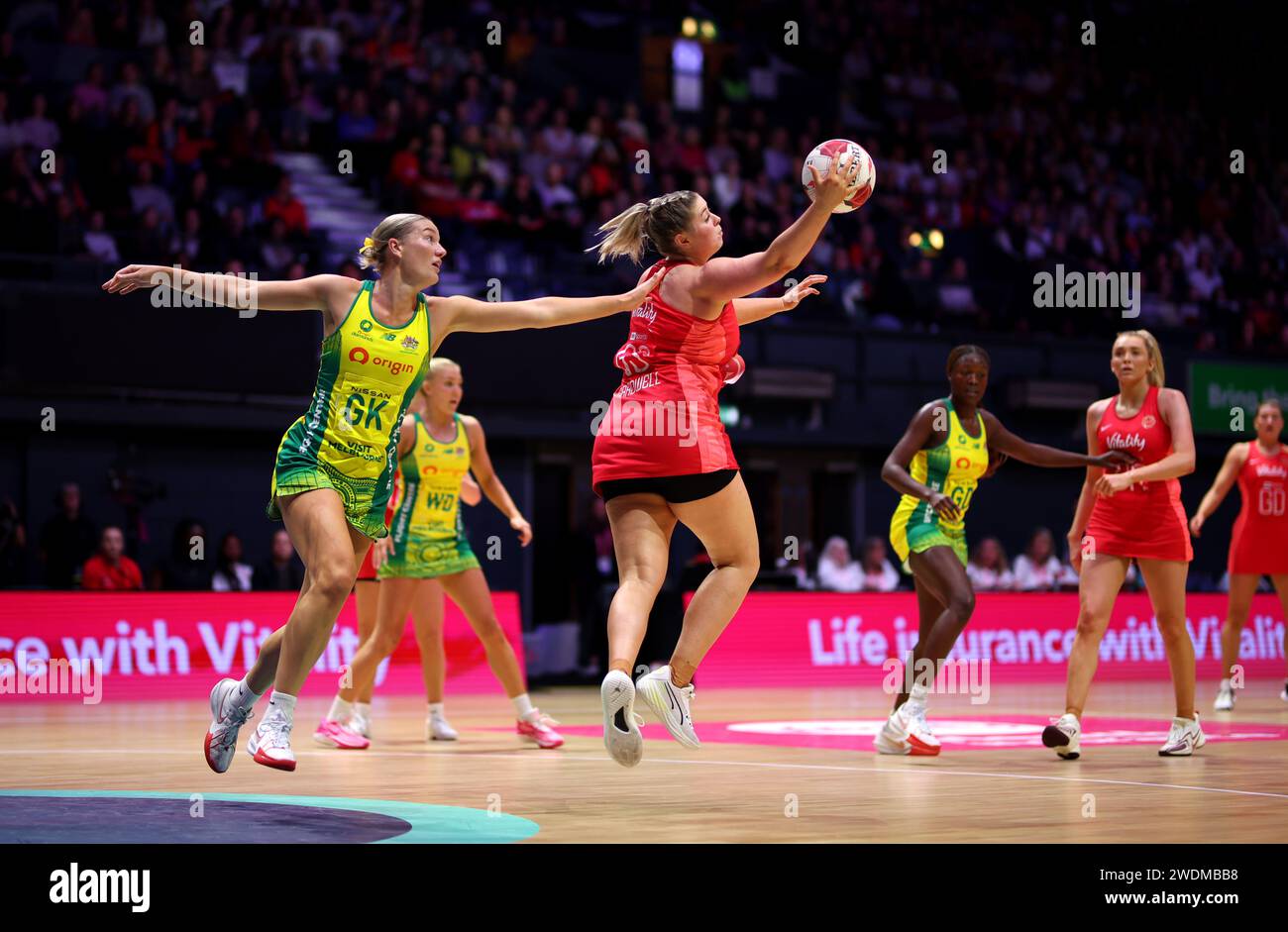 Australia s Courtney Bruce And England s Eleanor Cardwell In Action australia-s-courtney-bruce-and-england-s-eleanor-cardwell-in-action
