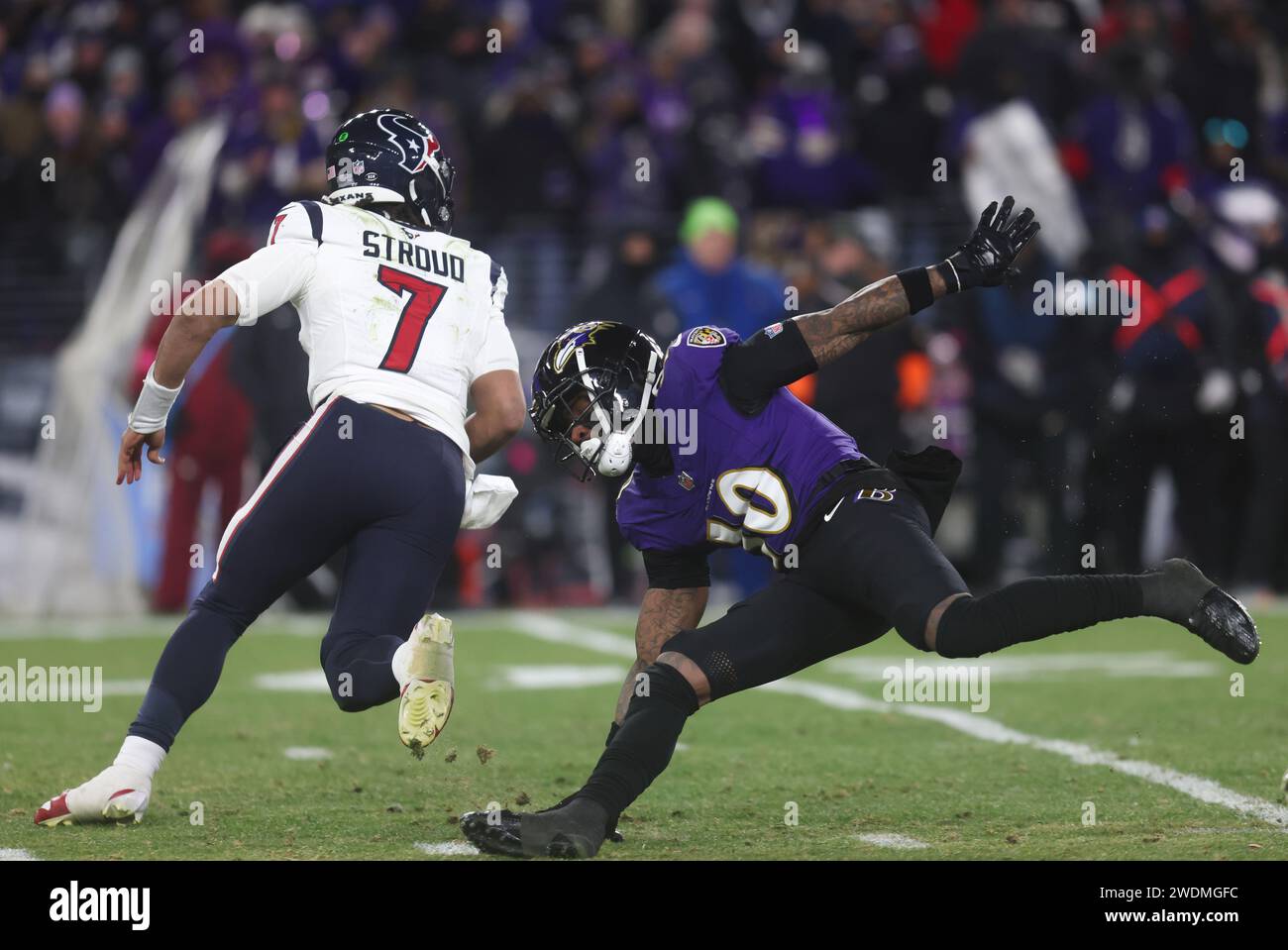 January 20, 2024: Houston Texans QB C.J. Stroud (7) is pursued by Baltimore Ravens CB Arthur Maulet (10) during the AFC divisional playoff game at M&T Bank Stadium in Baltimore, MD. Photo/ Mike Buscher/Cal Sport Media (Credit Image: © Mike Buscher/Cal Sport Media/Cal Sport Media) Stock Photo