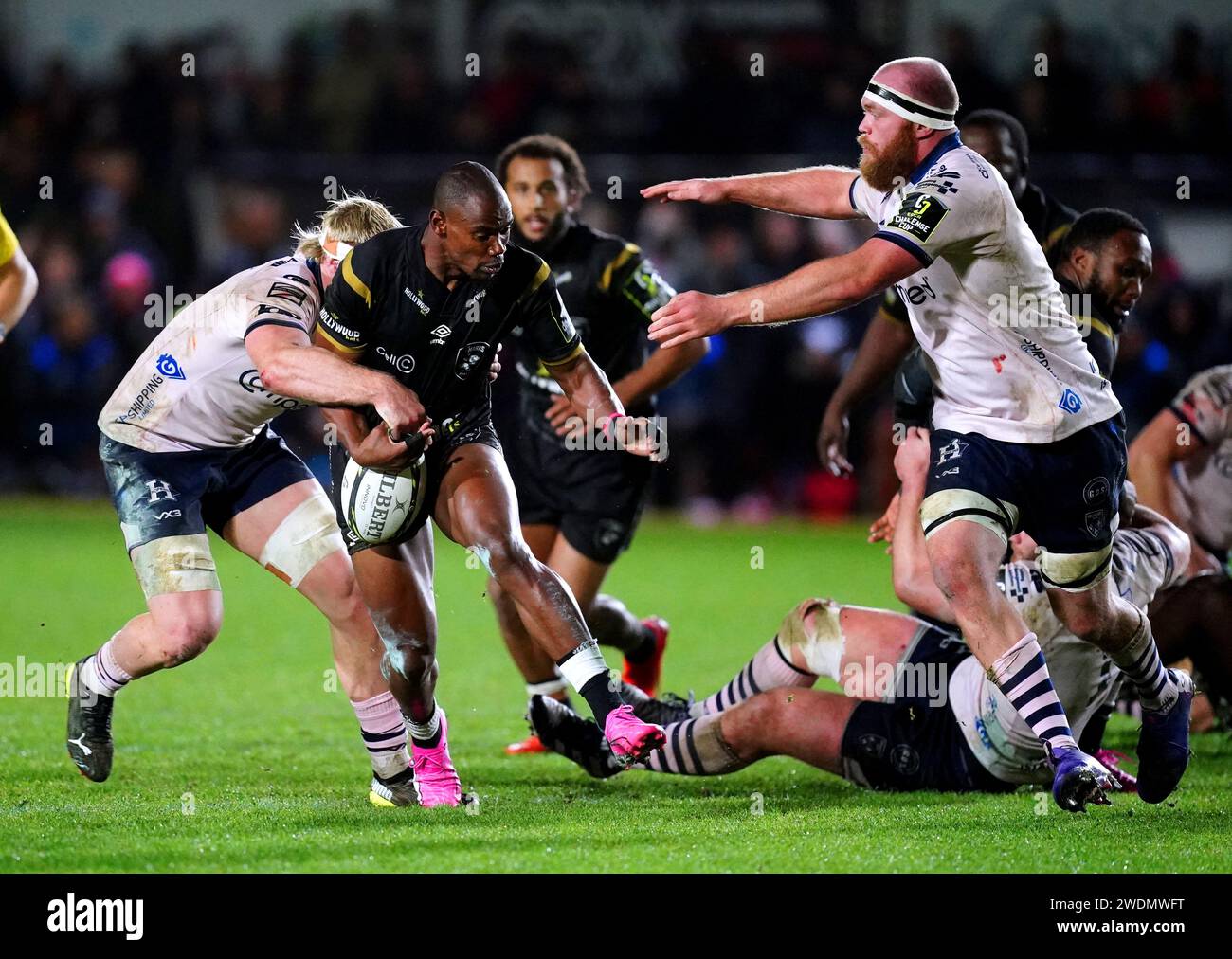 Hollywoodbets Sharks' Makazole Mapimpi is tackled by Dragons RFC's ...