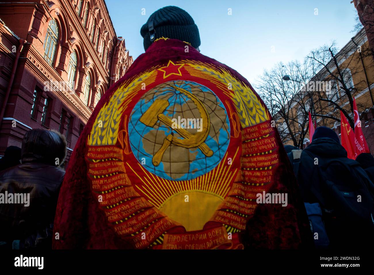 Moscow, Russia. 21st of January, 2024. Supporters of the Russian Communist Party attend a ceremony to lay flowers at Lenin's Mausoleum to mark the 100th death anniversary of Russian revolutionary Vladimir Lenin, in Red Square, Moscow, Russia. Credit: Nikolay Vinokurov/Alamy Live News Stock Photo