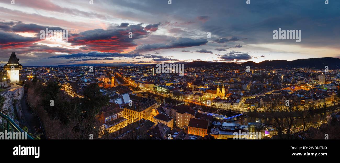 Graz city night top view with illuminated buildings (Austria). Panorama. Stock Photo